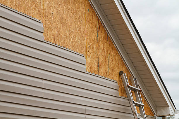 Professional Siding Installation technician working in Englishtown, NJ